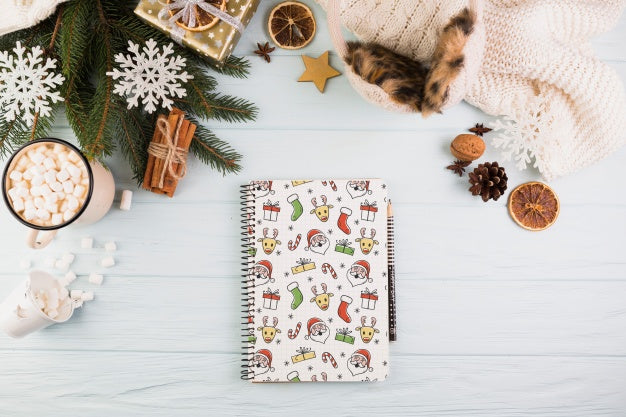 Free Notebook Mockup With Christmas Decoration Psd