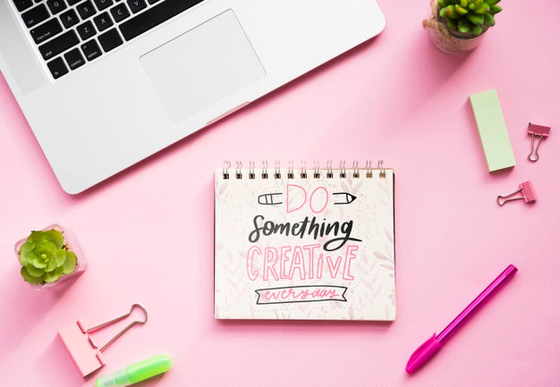Free Notebook On Desk With Positive Message Psd