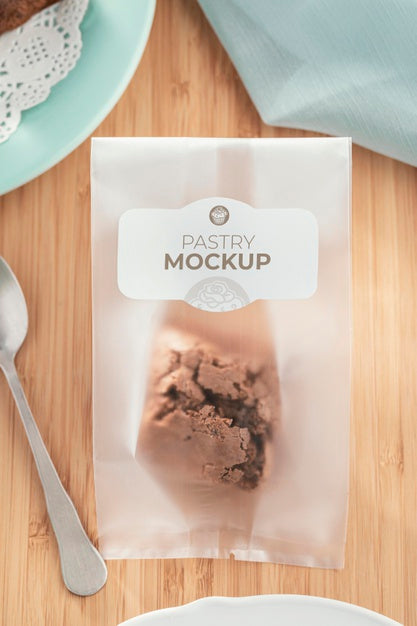Free Pastry In Transparent Packaging Above View Psd