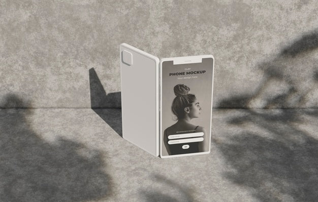 Free Phone Mockup On Concret Wall With Shadow Psd
