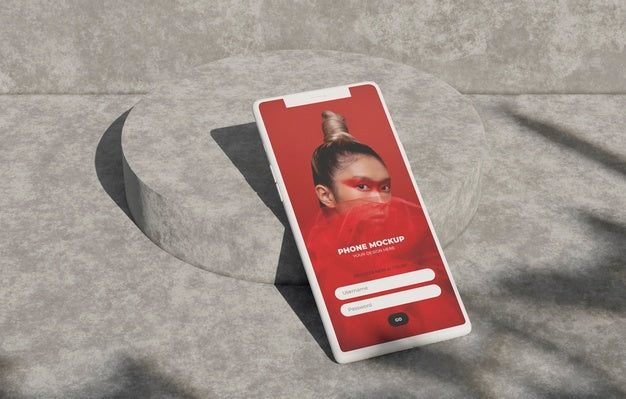 Free Phone Mockup On Concret Wall With Shadow Psd
