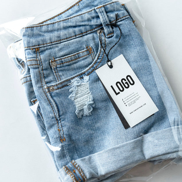 Free Ripped Jean Shorts With A Tag Mockup Psd
