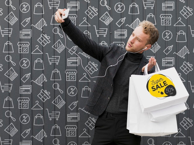 Free Smiley Man Taking Selfie With His Shoppings Psd