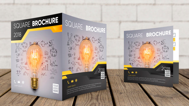 Free Square Brochure Mockup On Wooden Surface Psd