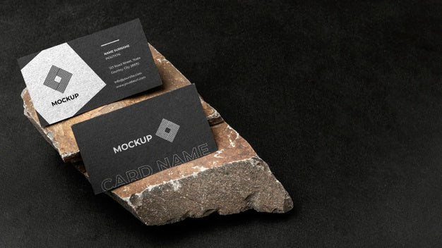 Free Stationery Mock-Up On Dark Concrete With Rugged Rock Psd