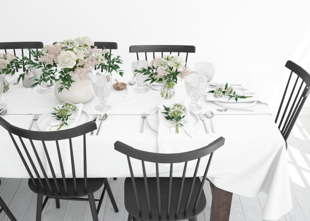 Free Table Prepared To Eat With Cutlery And Decorative Flowers Psd