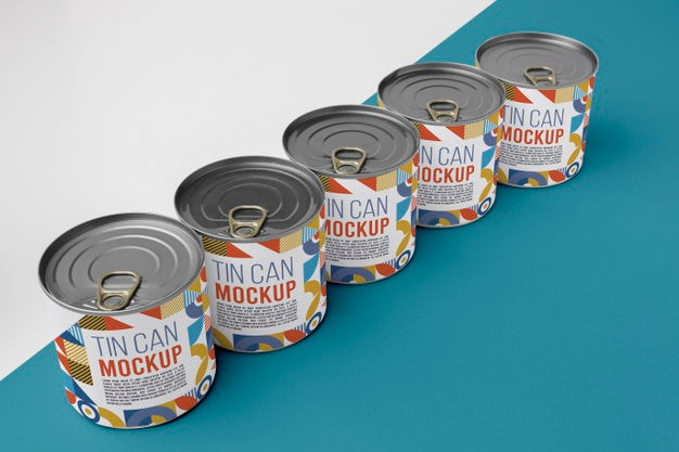 Free Tin Cans Arranged On Table Psd