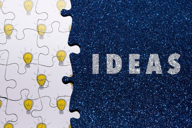 Free Top View Arrangement With Puzzle On Glitter Background Psd