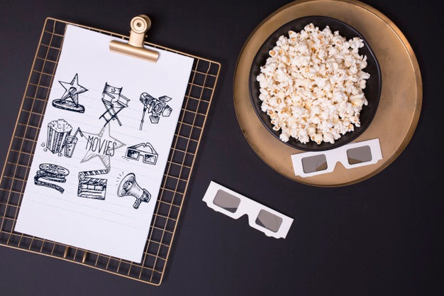 Free Top View Cinema Assortment On Black Background Psd