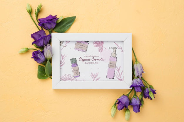 Free Top View Cosmetics Mockup With Flowers Psd