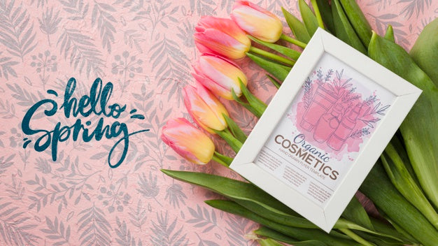 Free Top View Cosmetics Mockup With Flowers Psd