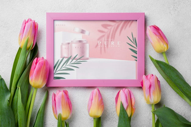 Free Top View Cosmetics Mockup With Flowers Psd
