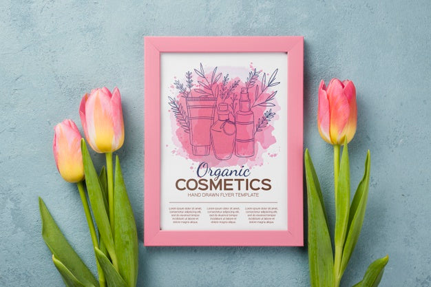 Free Top View Cosmetics Mockup With Flowers Psd