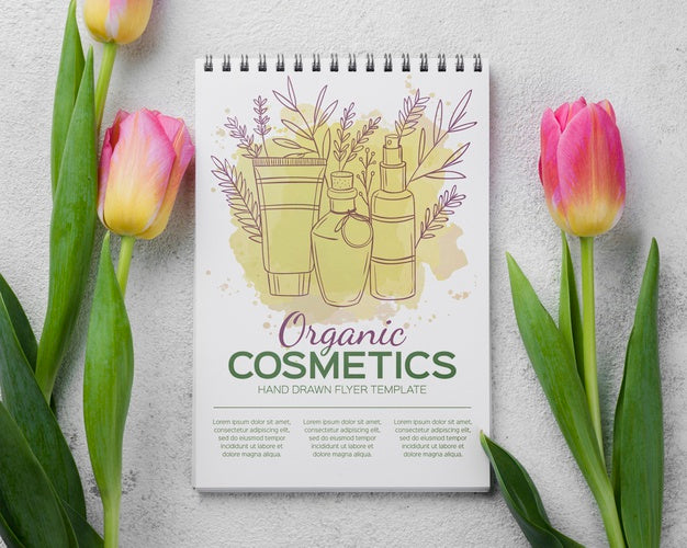 Free Top View Cosmetics Mockup With Flowers Psd