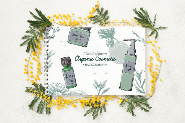 Free Top View Cosmetics Mockup With Flowers Psd