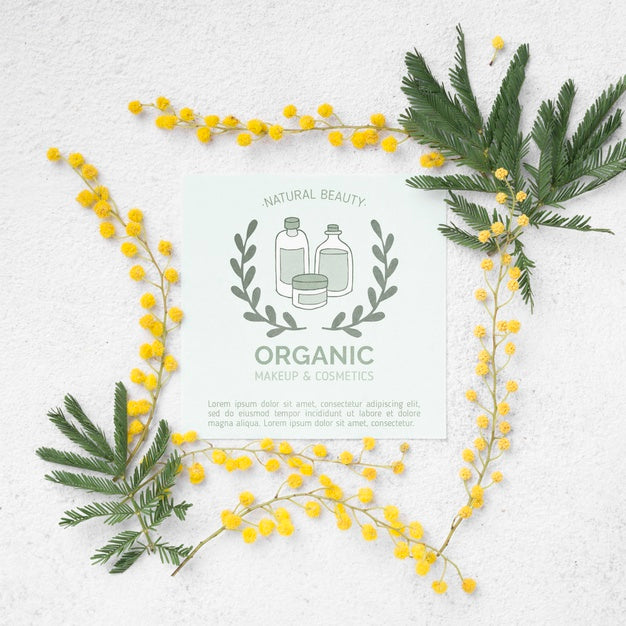 Free Top View Cosmetics Mockup With Flowers Psd