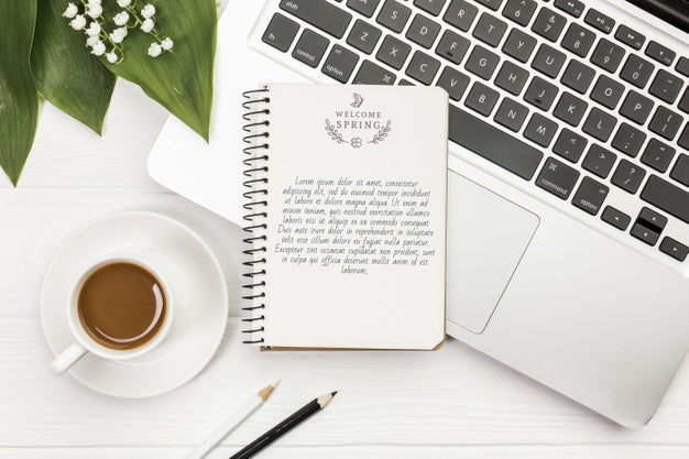 Free Top View Notebook On Top Of Laptop Concept Psd