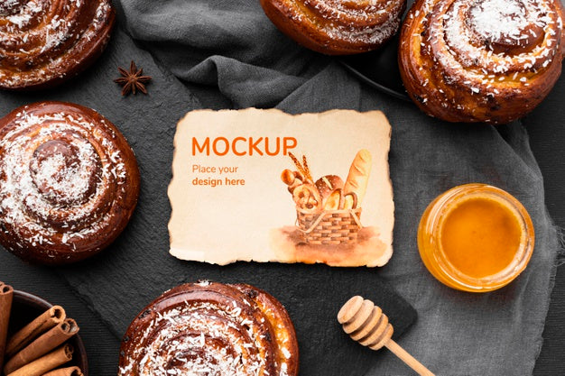 Free Top View Of Cinnamon Buns With Honey Psd