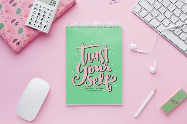 Free Top View Of Desk With Notebook And Earphones Psd