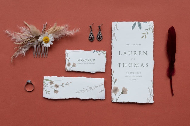 Free Top View Of Mock-Up Rustic Paper Wedding Invitation With Leaves And Flowers Psd