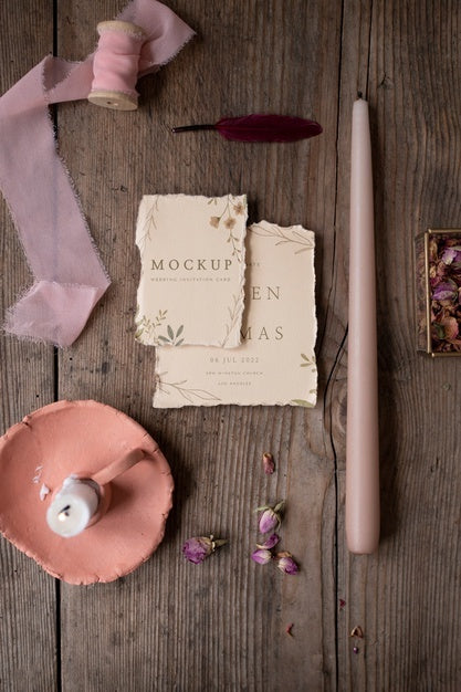 Free Top View Of Paper Mock-Up Rustic Wedding Invitation With Leaves And Flowers Psd