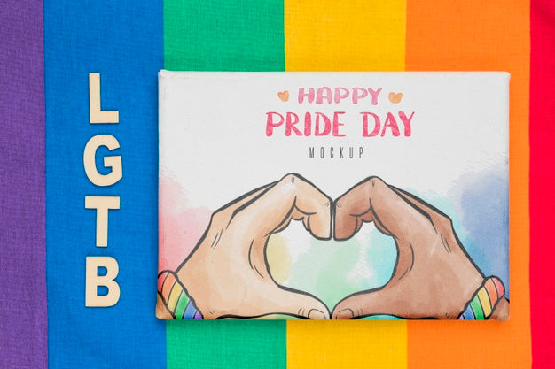 Free Top View Of Rainbow Flag With Greeting Psd