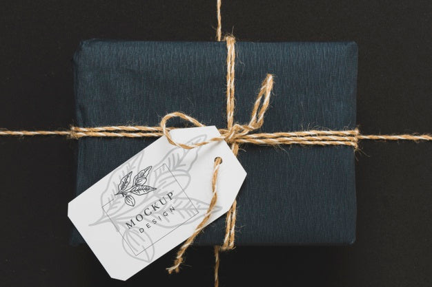 Free Top View Of Wrapped Present With Tag Psd