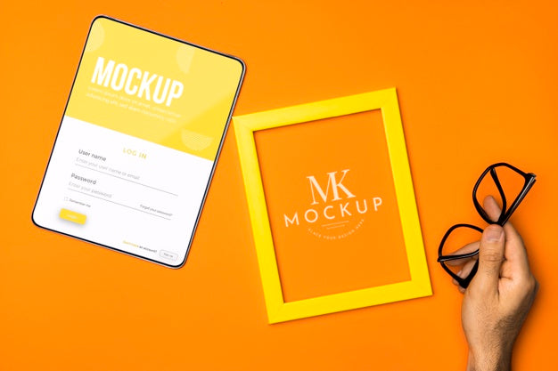 Free Top View Tablet And Frame Arrangement Psd