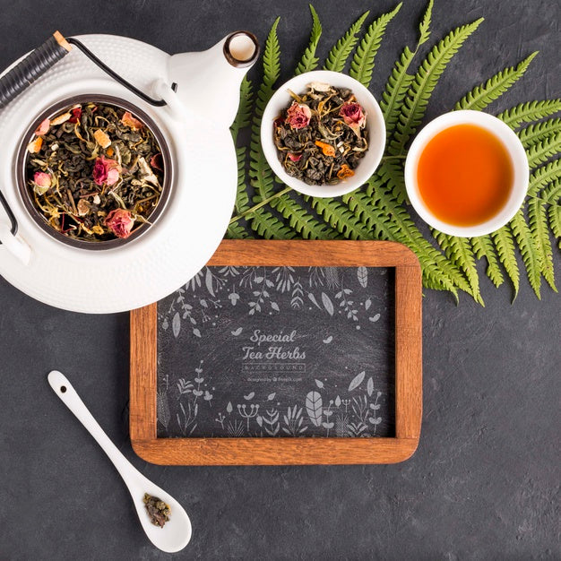 Free Top View Tea Pot With Menu And Herbs Psd