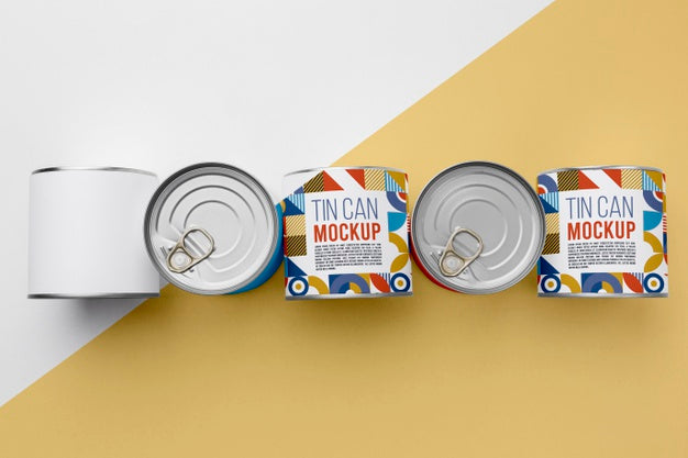 Free Top View Tin Cans Arranged On Table Psd