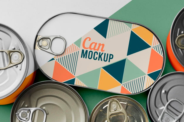 Free Top View Tin Cans Arranged On Table Psd