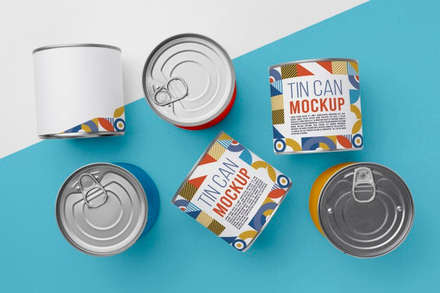 Free Top View Tin Cans Arranged On Table Psd