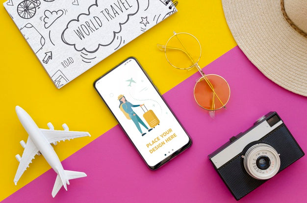Free Top View Travelling Plane With Retro Camera And Phone Psd