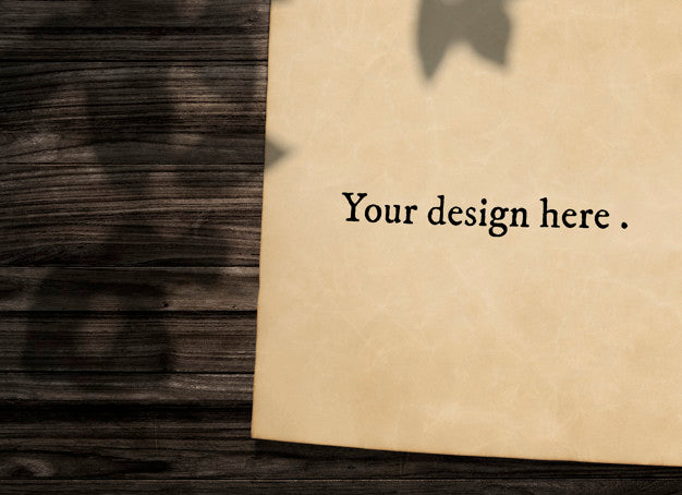 Free Vintage Paper Mockup On Wooden Background Psd