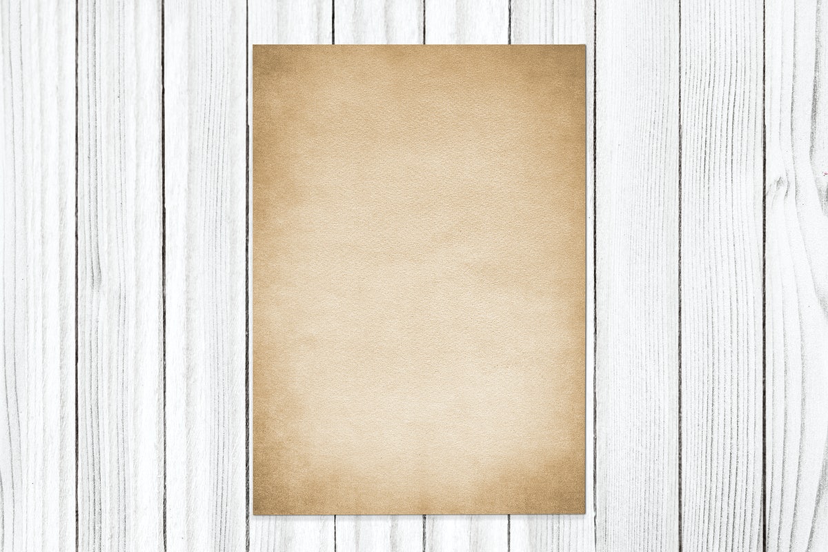 Free Vintage Paper On A Wooden Background