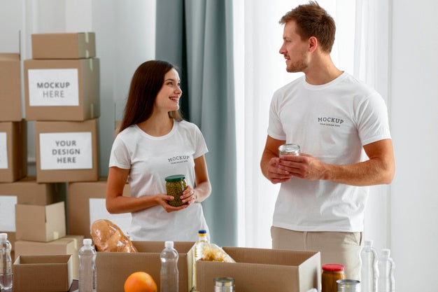Free Volunteers Preparing Provision Boxes For Donation Psd
