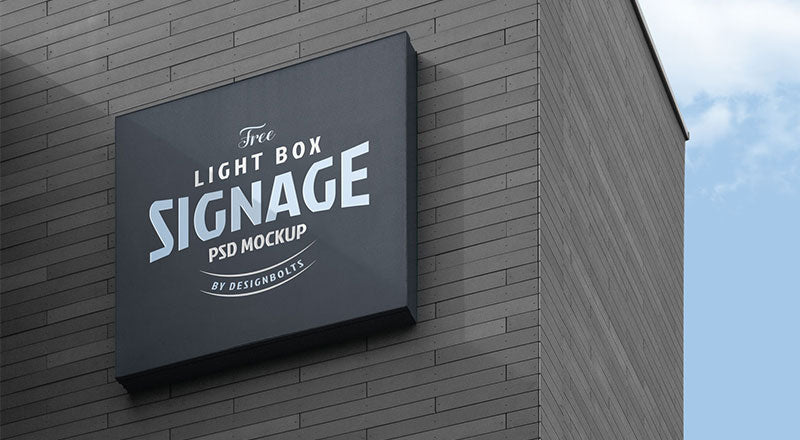 Free Wall Mounted Company Logo Signage Board On Building Mockup Psd