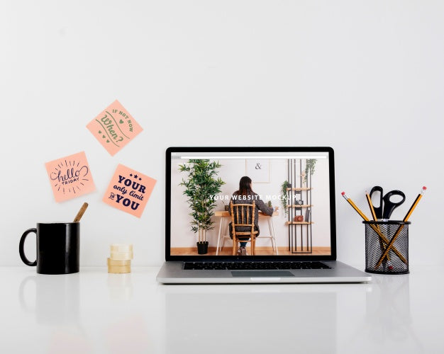 Free Website Mockup With Laptop On Desk Psd