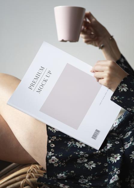 Free Woman Reading A Magazine Mockup With A Cup Of Coffee Psd