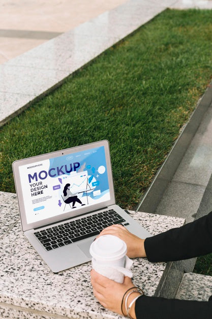 Free Woman Working Outdoors Laptop Mock-Up Psd