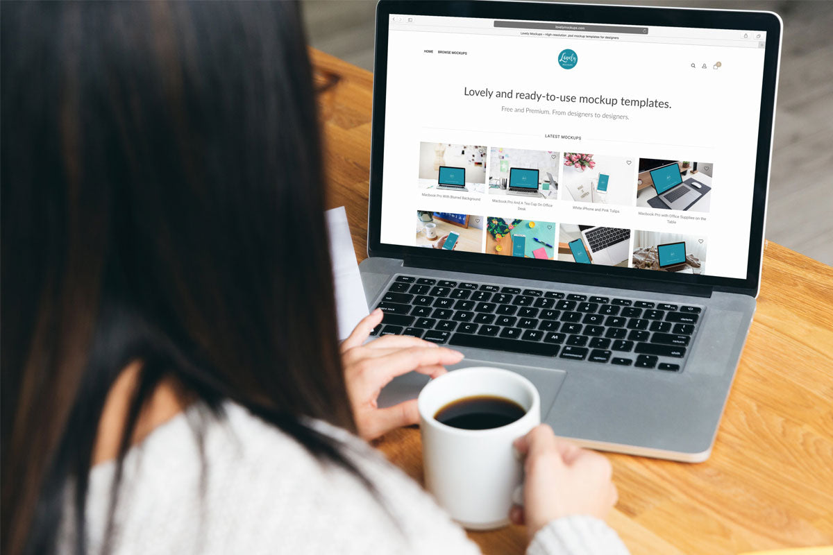 Free Woman Working on a 15 Inch Macbook Pro