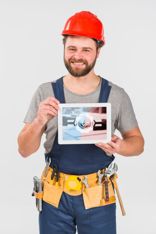 Free Worker Holding Tablet Mockup For Labor Day Psd
