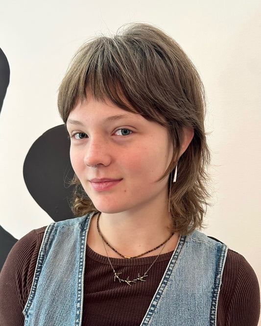13 Wolf Haircuts With Bangs Trends to Know