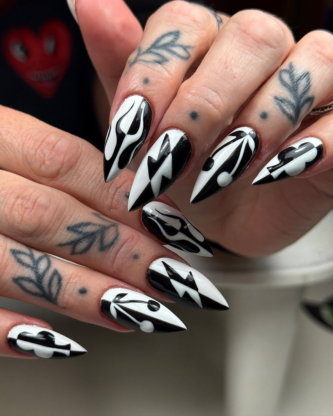 Geometric Black Silver Nails That Shine