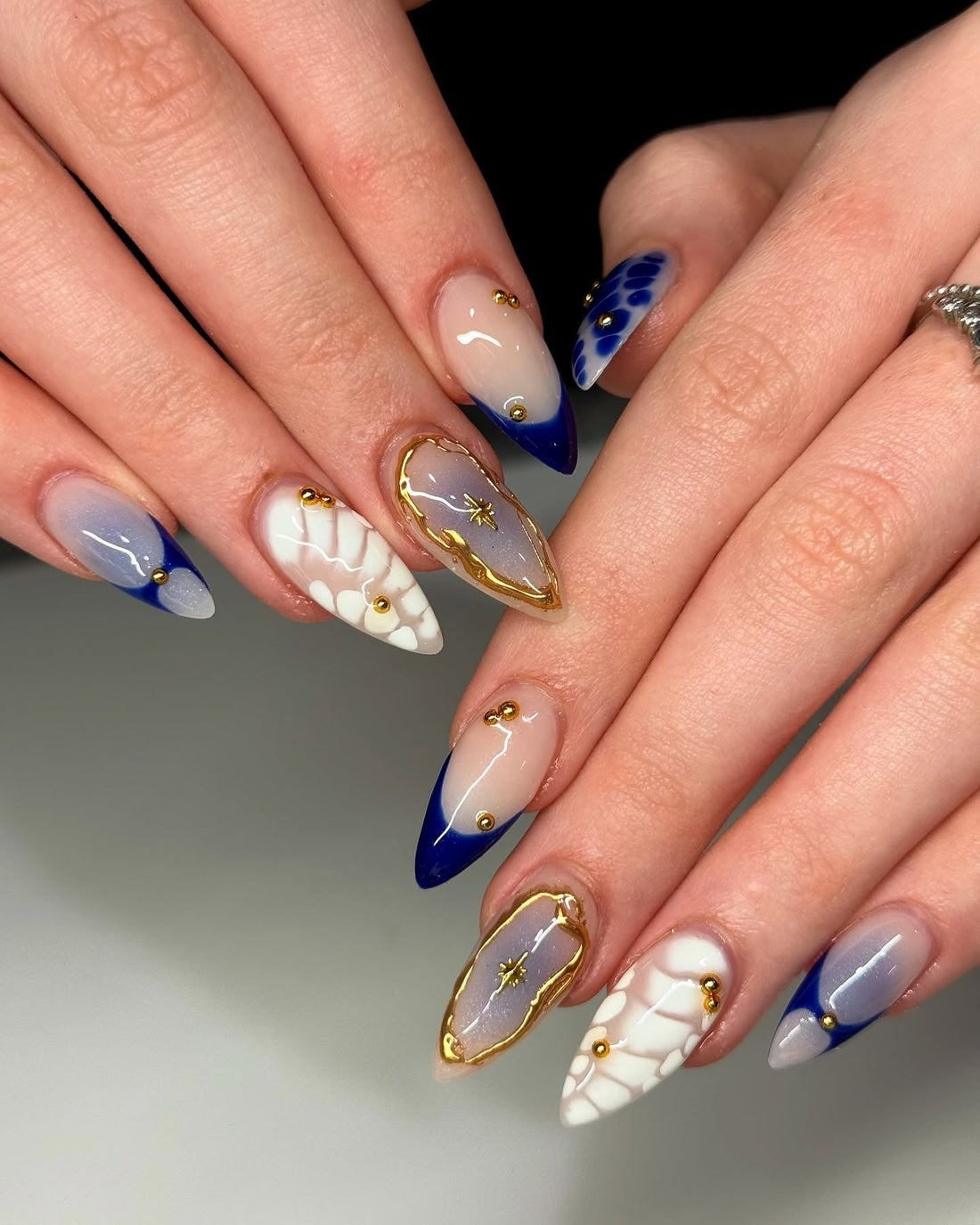 Navy Nail Art That Shines with Gold