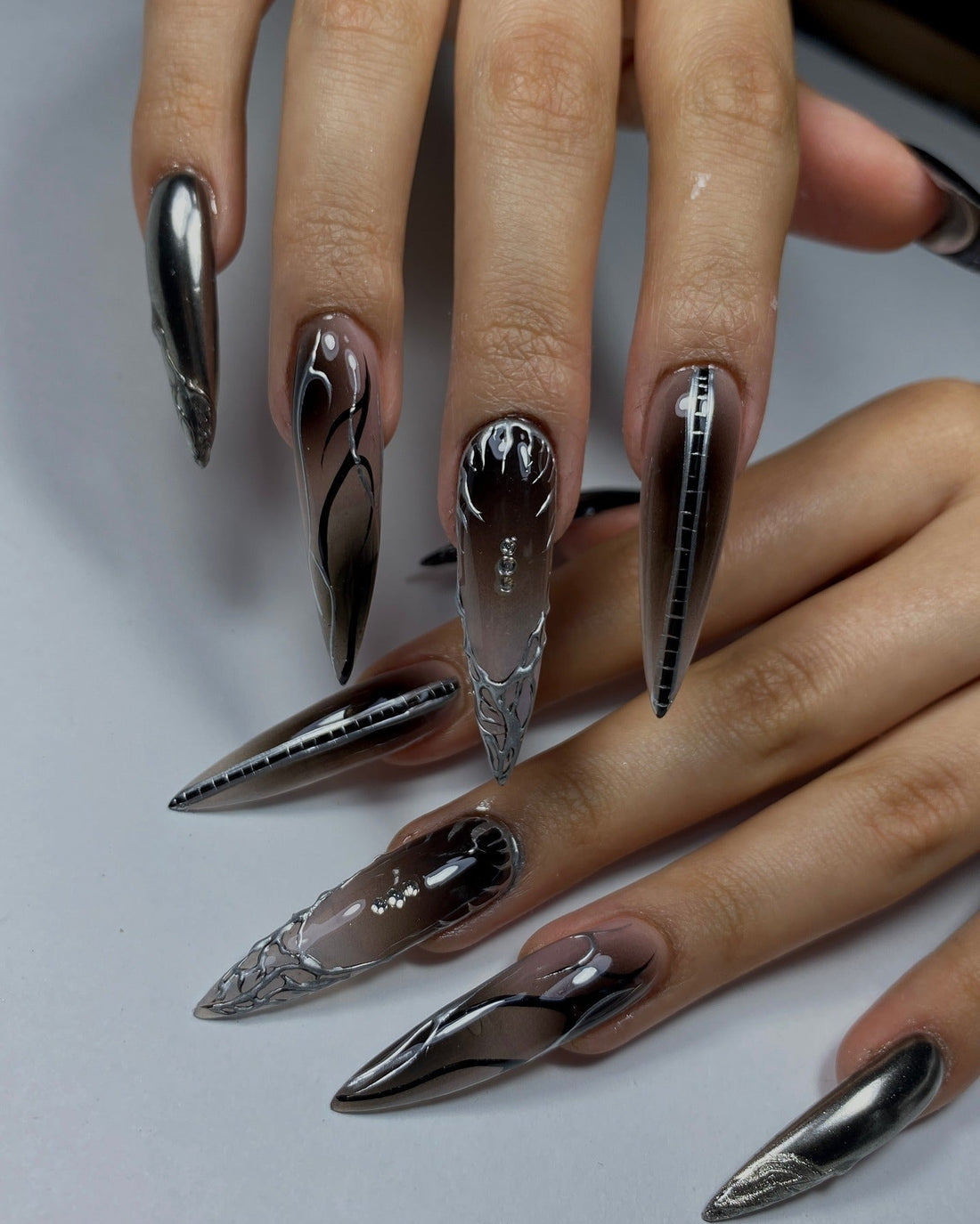 Edgy Stiletto Nails with Negative Space