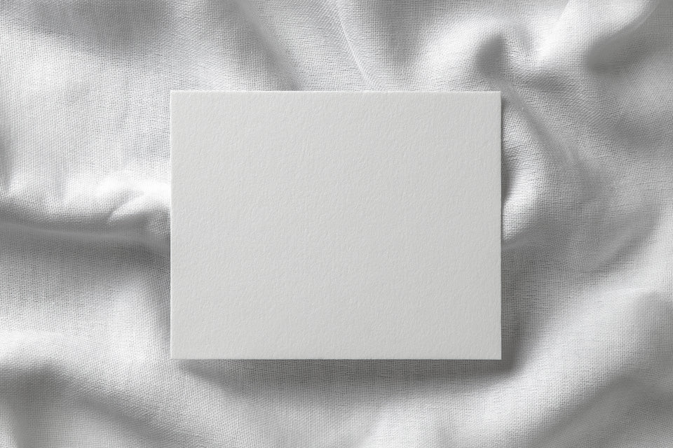 Free Invitation Card Mockup in a Linen Background