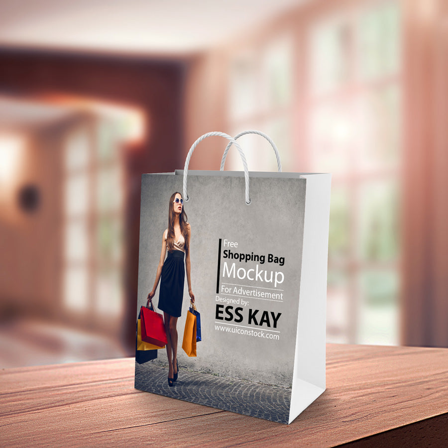 Free Paper Shopping Bag on Table Mockup