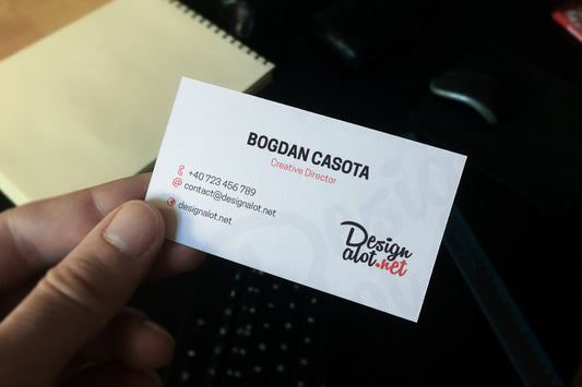 Free Business Card in Hand Mockup Sample