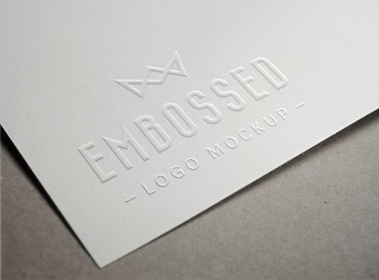Free Embossed White Paper Logo PSD MockUp